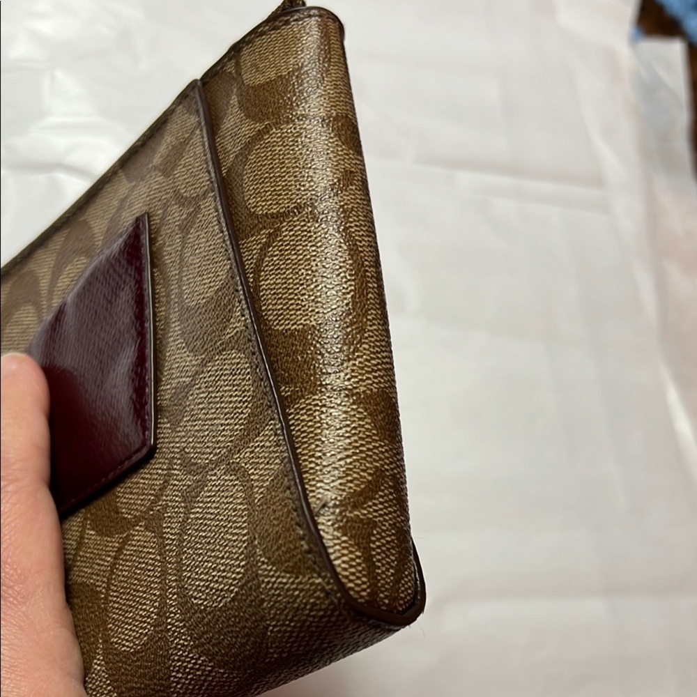 Coach Brown Clutch with Monogram Pattern and Zipper Closure - Picture 13 of 13